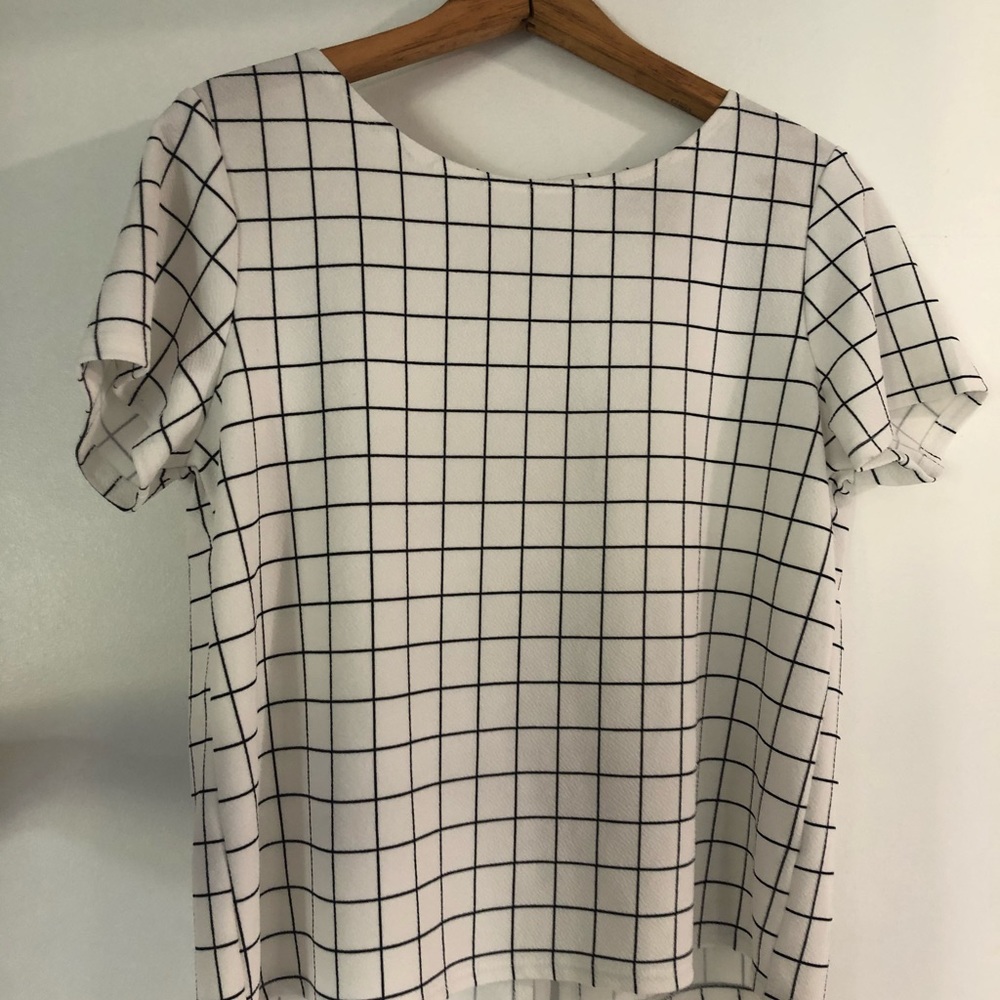 Black and white checkered blouse